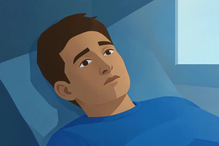 Homem deitado na cama, olhando para o teto com um olhar vazio e desanimado.